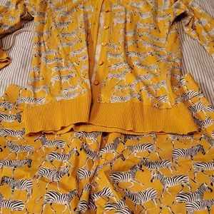 Super cute cardigan and short set. Only women once